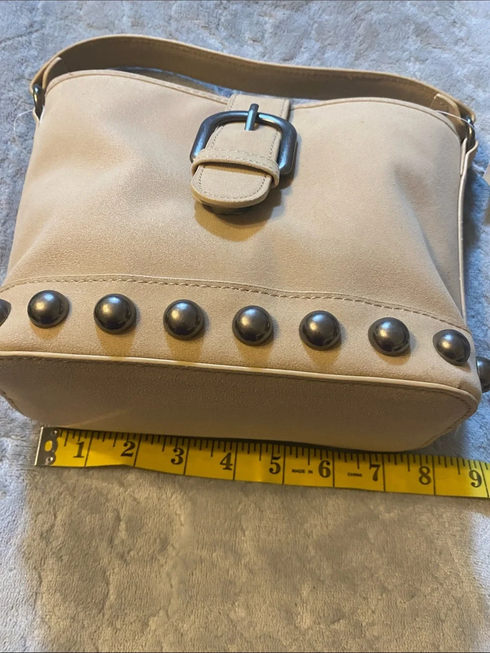 New No Boundaries Stud-Trim Tan Crossbody Bag with Buckle Strap